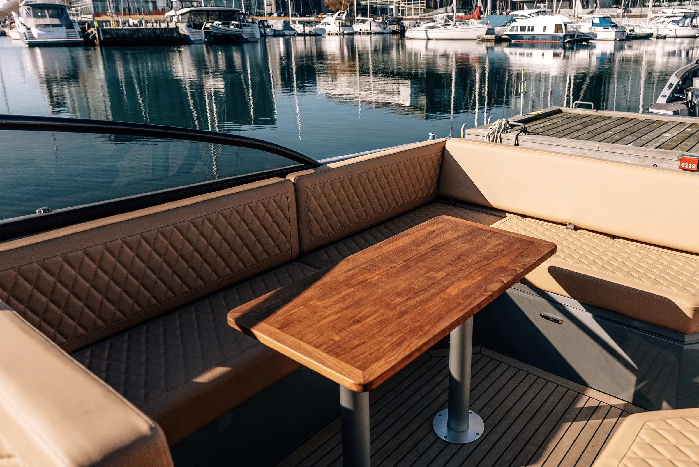Cockpit table and diamond-stitched seating on Supreme 27
